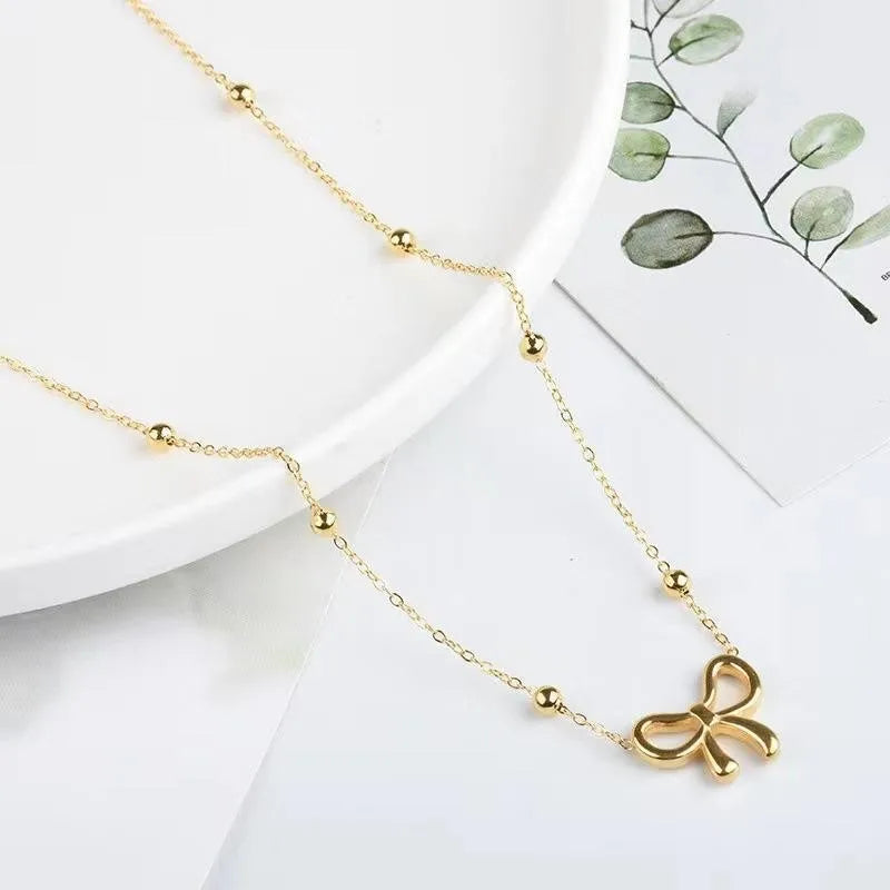 Luna Bow Pendant Necklace
